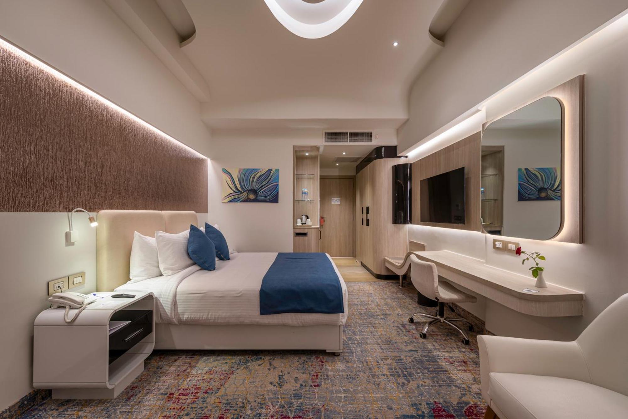 Mirage Hotel & Conference Center Александрия Экстерьер фото Deluxe Room